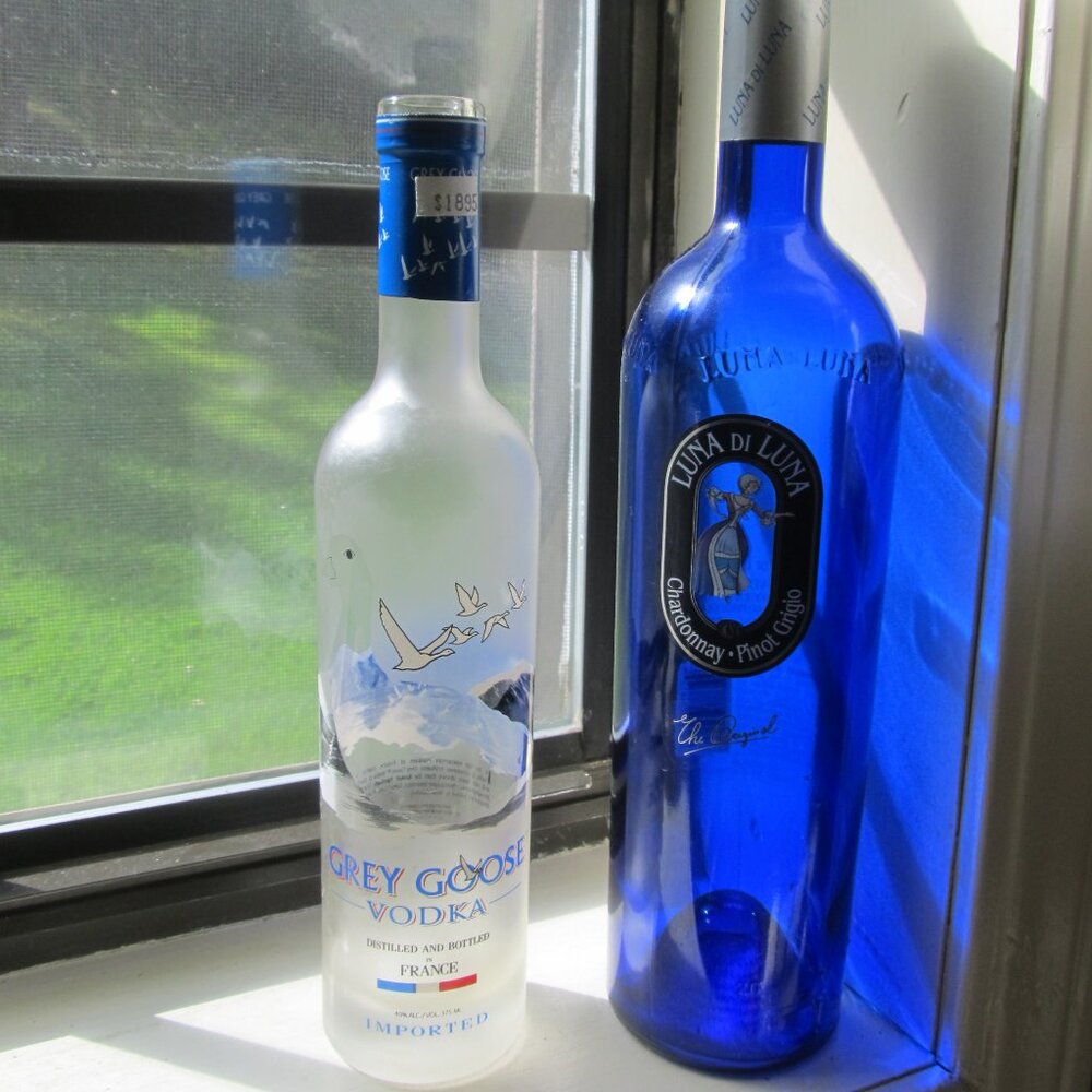 Vintage Glass: Cobalt Blue Empty Wine Bottle & Empty Grey Goose Vodka Bottle